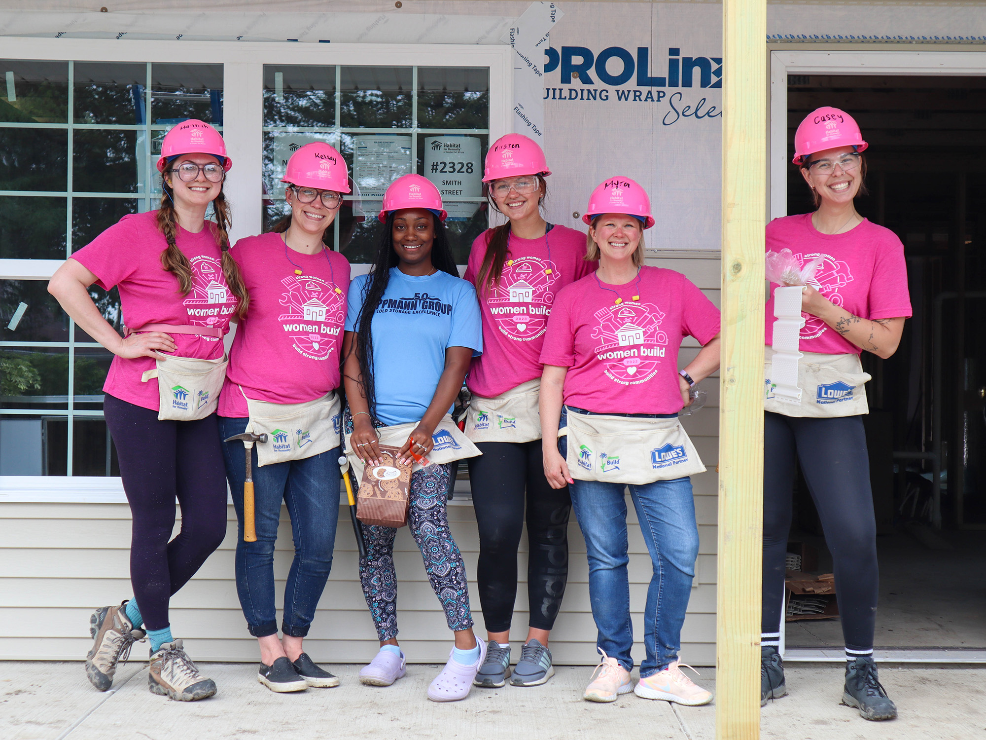 Women Build Volunteers on porch