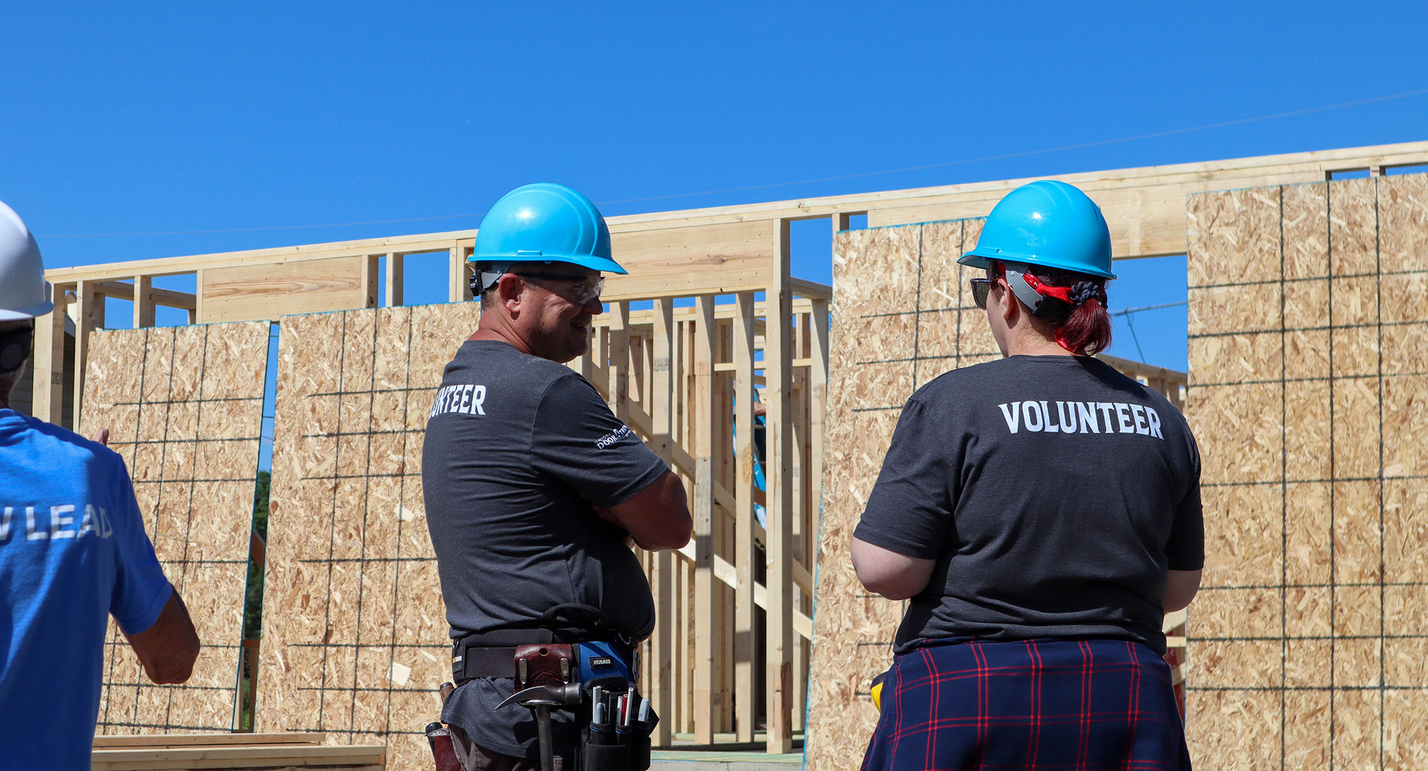 volunteers talking at worksite