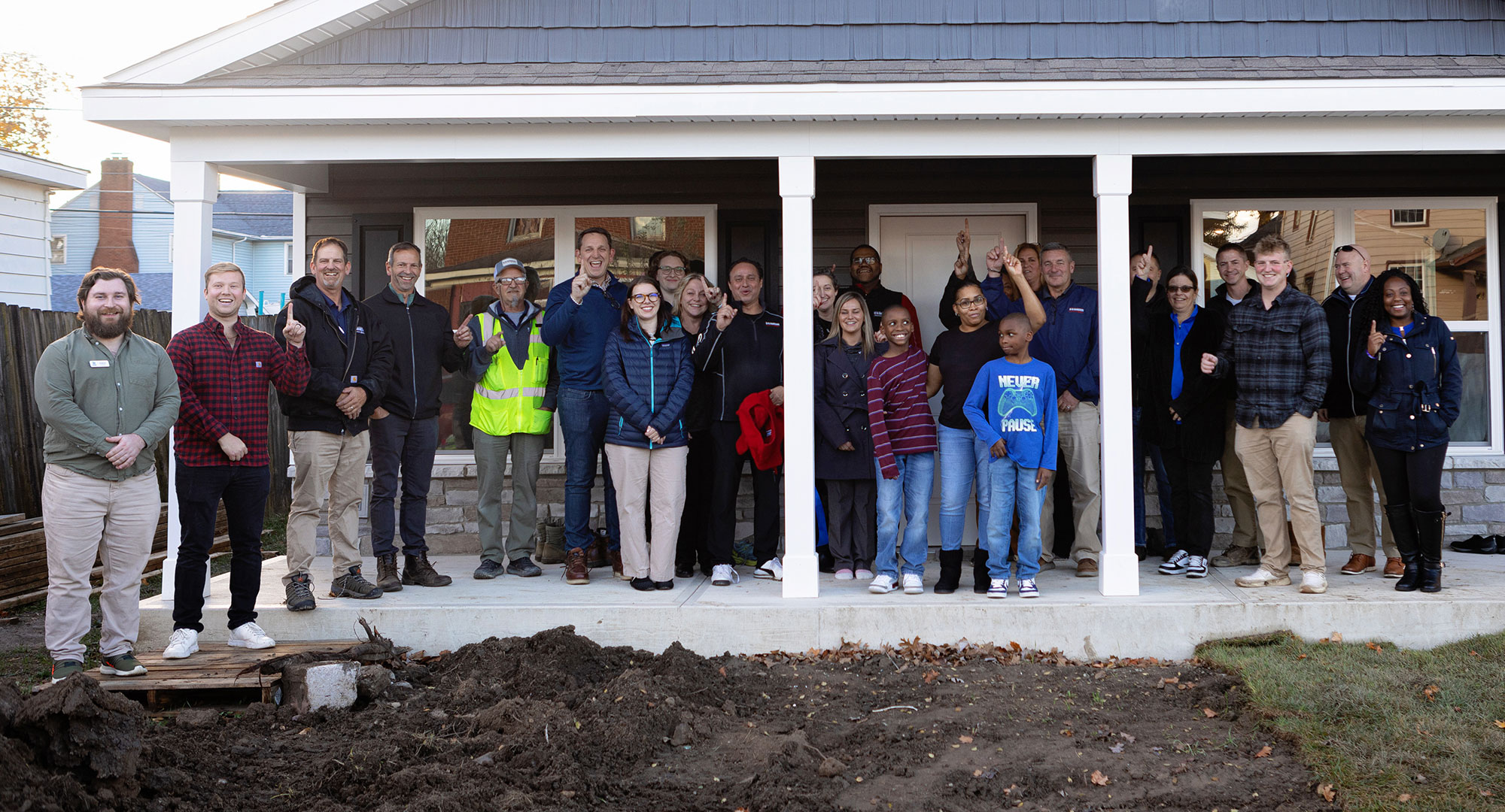 Group of people outside Habitat home